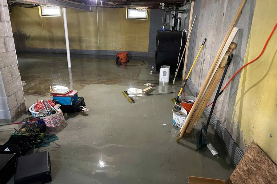 Flooded basement being cleaned in a Des Plaines, IL home