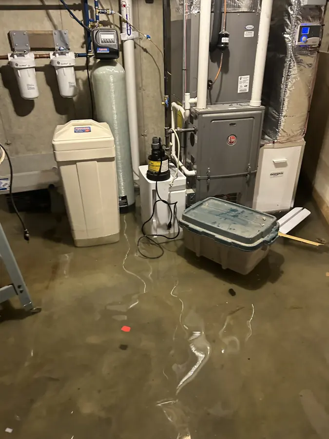 Sump pump and pit in a Des Plaines, IL basement